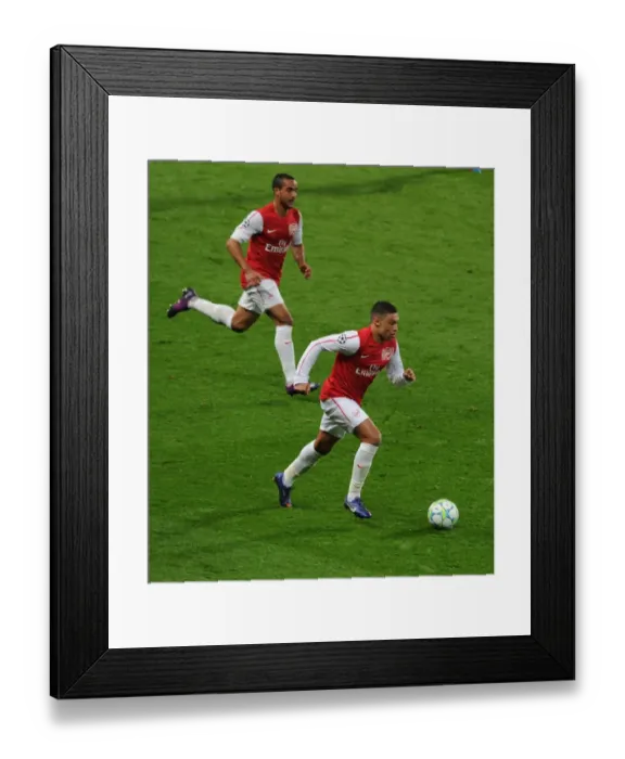 Framed Print : Arsenal's Oxlade-Chamberlain and Walcott in Action against AC Milan, UEFA Champions League 2012 Framed Print : Arsenal's Oxlade-Chamberlain and Walcott in Action against AC Milan, UEFA Champions League 2012
