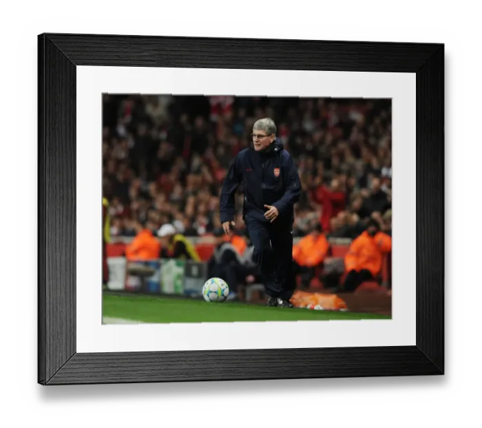 Framed Print : Arsenal FC vs AC Milan: Pat Rice Leads the Assault in the 2011-12 UEFA Champions League