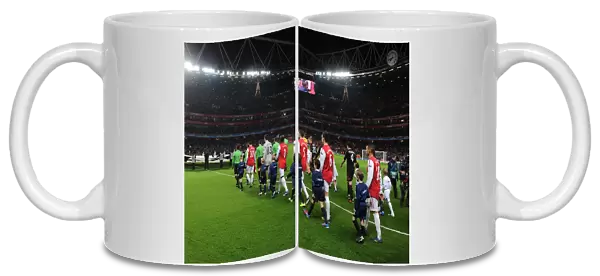 The Arsenal players walk out onto the pitch before the match. Arsenal 3: 0 AC Milan
