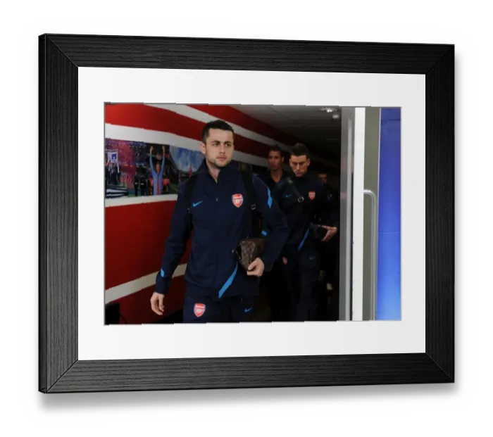 Framed Print : Arsenal Crushes AC Milan: Lukasz Fabianski's Shut-Out Leads 3-0 Victory in UEFA Champions League