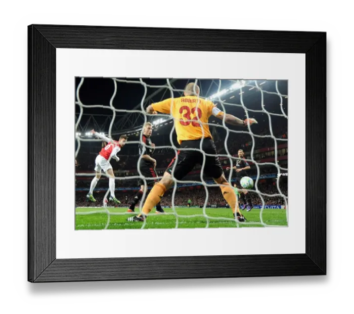 Framed Print : Arsenal Crushes AC Milan: Laurent Koscielny's Header Secures 3-0 Victory in UEFA Champions League Framed Print : Arsenal Crushes AC Milan: Laurent Koscielny's Header Secures 3-0 Victory in UEFA Champions League