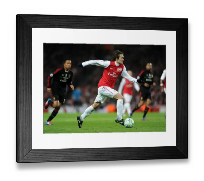 Framed Print : Arsenal's Triumph: Rosicky's Brilliance Leads Arsenal to 3-0 Victory over AC Milan in UEFA Champions League