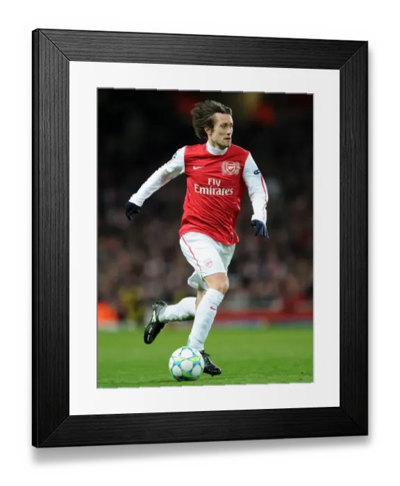 Framed Print : Arsenal's Triumph: Rosicky's Brilliance Powers 3-0 Victory over AC Milan in Champions League