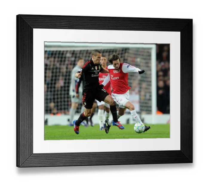 Framed Print : Arsenal's Triumph: Rosicky's Brilliance Leads 3-0 Victory over AC Milan in UEFA Champions League