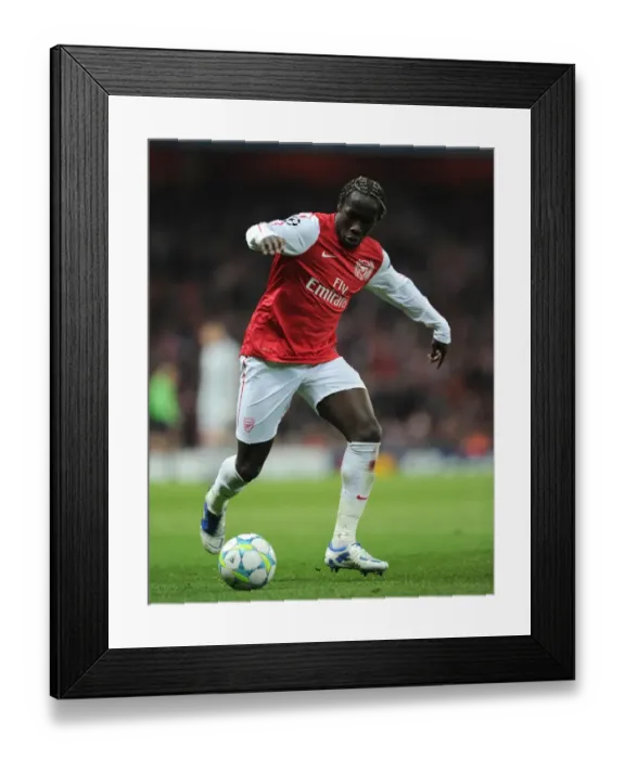 Framed Print : Bacary Sagna (Arsenal). Arsenal 3: 0 AC Milan. UEFA Champions League. 1st Knock Out Round, 2nd Leg