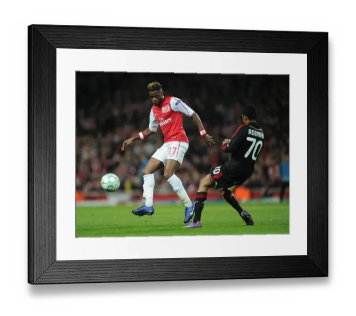 Framed Print : Alex Song (Arsenal) Robinho (Milan). Arsenal 3: 0 AC Milan. UEFA Champions League
