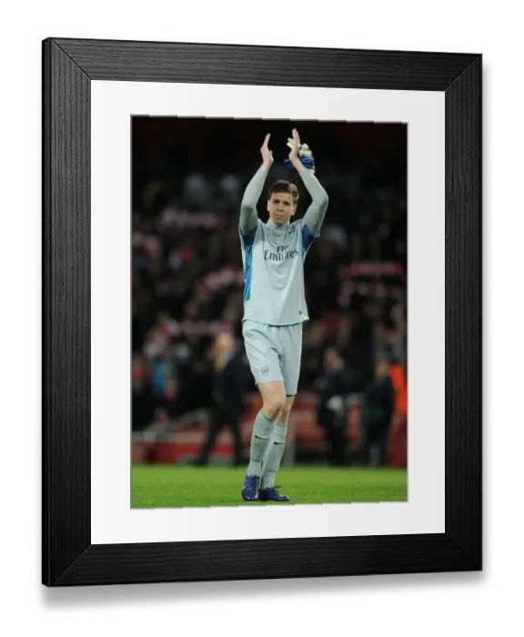 Framed Print : Arsenal's Glorious Night: Wojciech Szczesny Celebrates 3-0 Win Over AC Milan in the UEFA Champions League