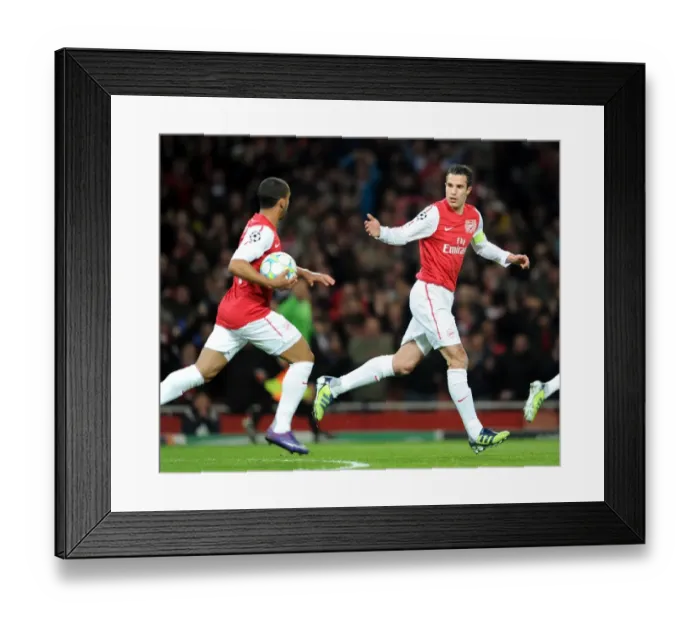 Framed Print : Arsenal's Triumph: Rvp and Walcott's Goals Secure 3-0 Victory Over AC Milan in UEFA Champions League