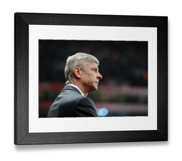 Framed Print : Arsenal's Triumph: Arsene Wenger Leads Arsenal FC to a 3-0 Victory over AC Milan in the UEFA Champions League