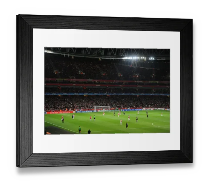 Framed Print : Champions League Clash: Arsenal FC vs AC Milan at Emirates Stadium
