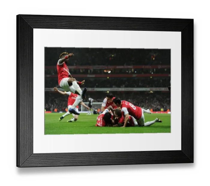 Framed Print : Arsenal's Vermaelen Scores, Celebrates with Team against Newcastle United (2011-12) Framed Print : Arsenal's Vermaelen Scores, Celebrates with Team against Newcastle United (2011-12)