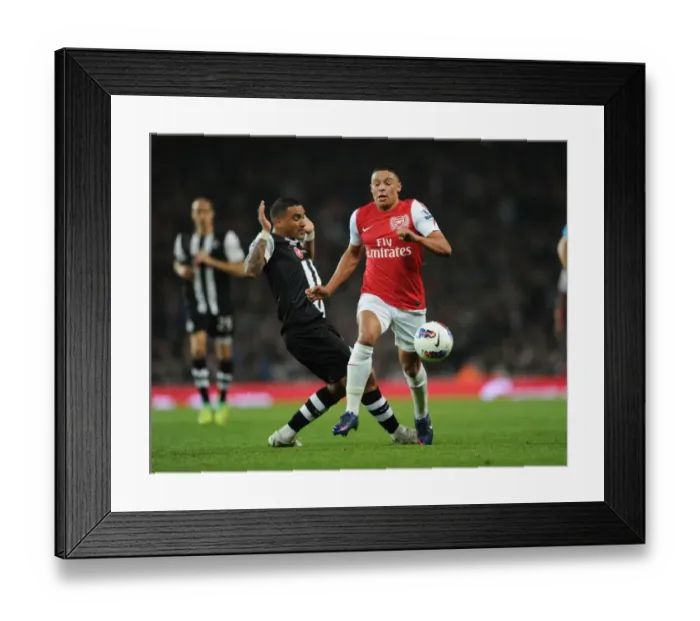 Framed Print : Arsenal's Alex Oxlade-Chamberlain Surges Past Newcastle's Danny Simpson in 2011-12 Premier League Clash