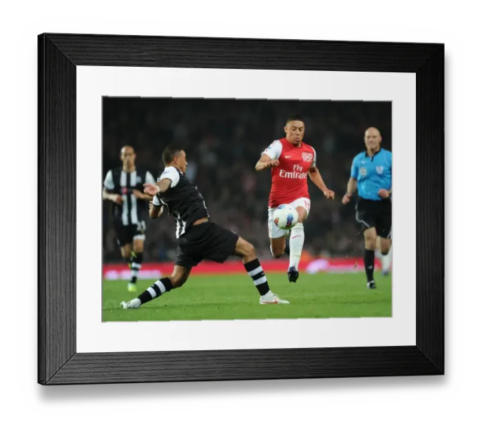 Framed Print : Arsenal's Oxlade-Chamberlain Outmaneuvers Newcastle's Simpson in 2011-12 Premier League Clash Framed Print : Arsenal's Oxlade-Chamberlain Outmaneuvers Newcastle's Simpson in 2011-12 Premier League Clash