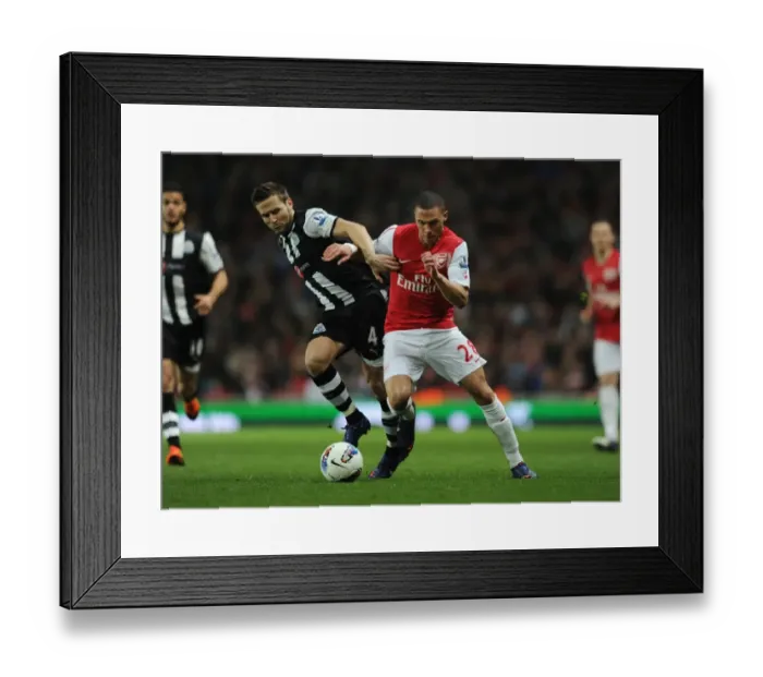 Framed Print : Arsenal's Kieran Gibbs Outsmarts Yohan Cabaye: A Premier League Showdown (2011-12)
