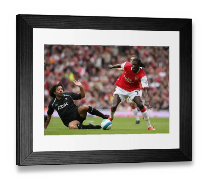 Framed Print : Emmanuel Adebayor (Arsenal) Ivan Campo (Bolton) Framed Print : Emmanuel Adebayor (Arsenal) Ivan Campo (Bolton)