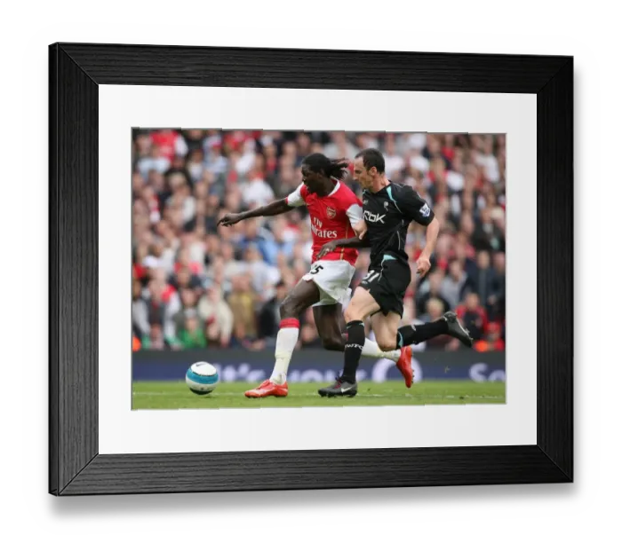 Framed Print : Emmanuel Adebayor (Arsenal) Andrew O Brien (Bolton)