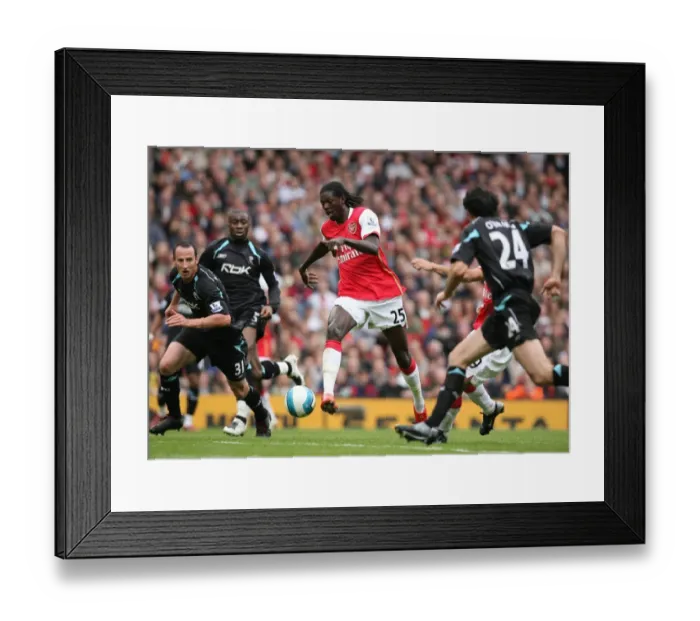 Framed Print : Adebayor's Brace: Arsenal Overpower Bolton 2-0 in Premier League Showdown Framed Print : Adebayor's Brace: Arsenal Overpower Bolton 2-0 in Premier League Showdown