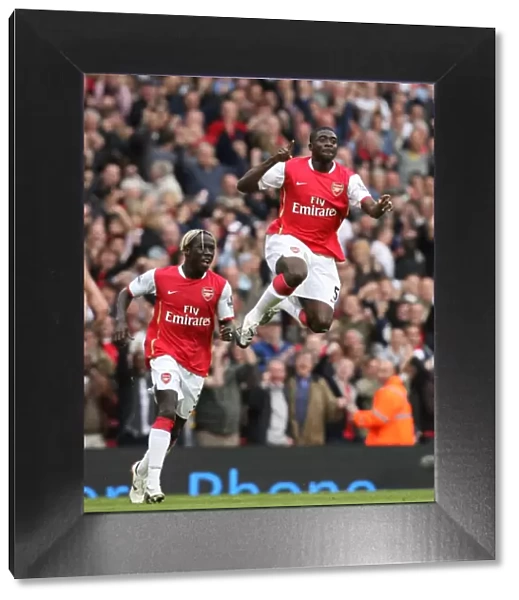 Kolo Toure celebrates scoring the 1st Arsenal goal