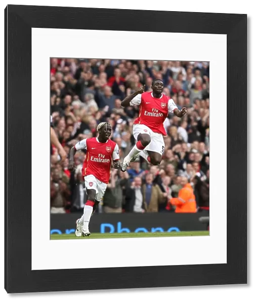Kolo Toure celebrates scoring the 1st Arsenal goal