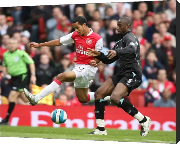 Theo Walcott (Arsenal) Abdoulaye Meite (Bolton)