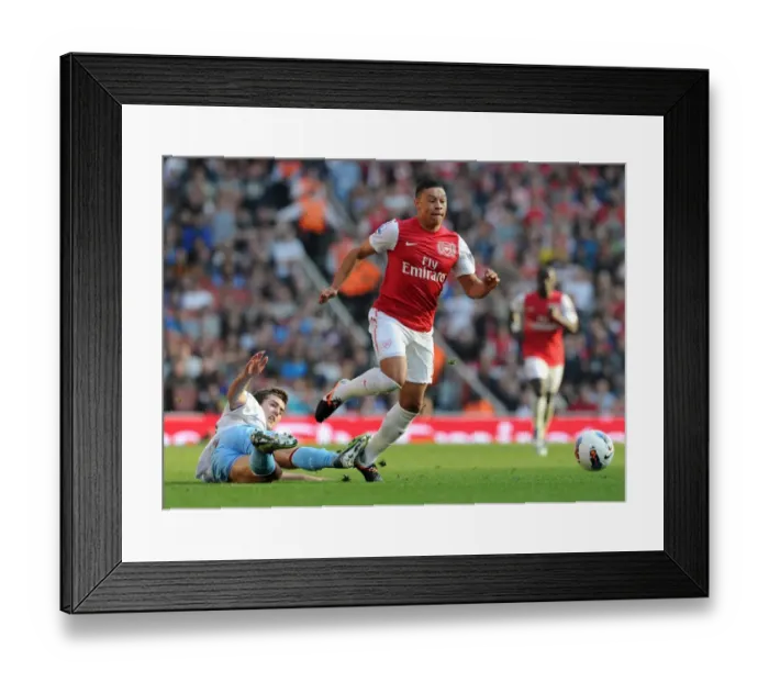 Framed Print : Arsenal's Oxlade-Chamberlain Shines in 3-0 Thrashing of Aston Villa Framed Print : Arsenal's Oxlade-Chamberlain Shines in 3-0 Thrashing of Aston Villa