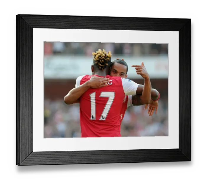 Framed Print : Arsenal's Unstoppable Duo: Theo Walcott and Alex Song's Triumphant 3-0 Victory Over Aston Villa Framed Print : Arsenal's Unstoppable Duo: Theo Walcott and Alex Song's Triumphant 3-0 Victory Over Aston Villa