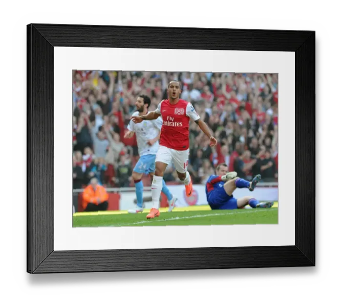 Framed Print : Theo Walcott's Double: Arsenal's 3-0 Victory Over Aston Villa in the Premier League Framed Print : Theo Walcott's Double: Arsenal's 3-0 Victory Over Aston Villa in the Premier League