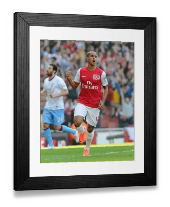 Framed Print : Theo Walcott celebrates scoring Arsenals 2nd goal. Arsenal 3: 0 Aston Villa