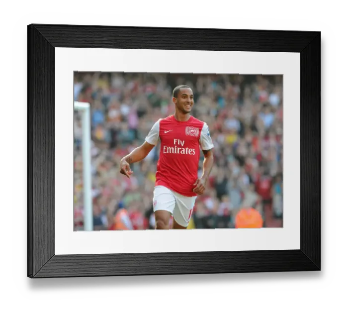 Framed Print : Theo Walcott's Double: Arsenal's Triumphant 3-0 Victory Over Aston Villa in the Premier League