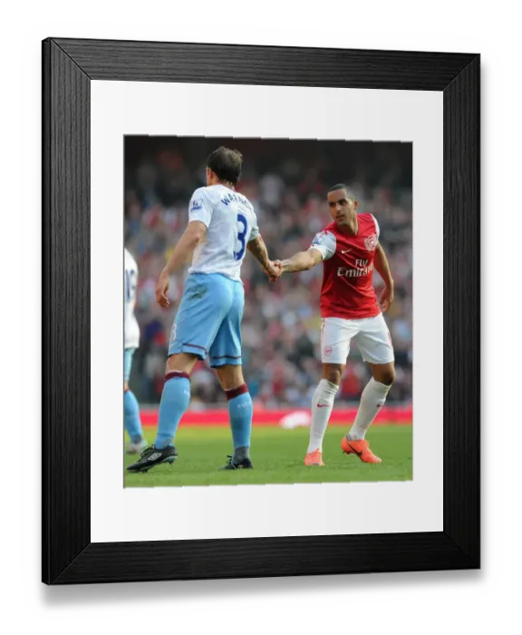 Framed Print : Theo Walcott's Substitution: A Handshake Between Rivals - Arsenal's 3-0 Victory Over Aston Villa