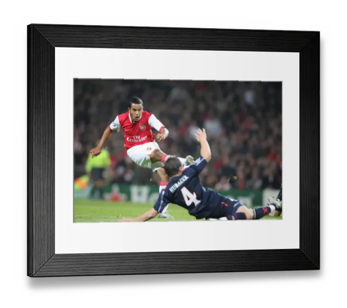 Framed Print : Theo Walcott shoots past David Hubacek (Slavia) to score Arsenals 3rd goal his 1st