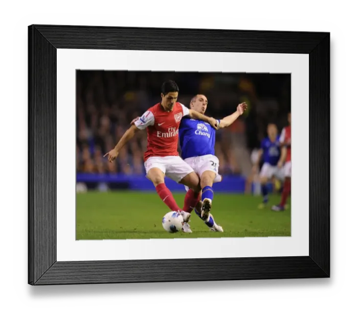 Framed Print : Mikel Arteta Outsmarts Leon Osman: A Premier League Clash between Everton and Arsenal, 2011-12