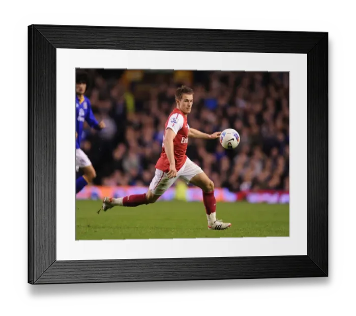 Framed Print : Aaron Ramsey in Action: Everton vs Arsenal, Premier League 2011-12 Framed Print : Aaron Ramsey in Action: Everton vs Arsenal, Premier League 2011-12