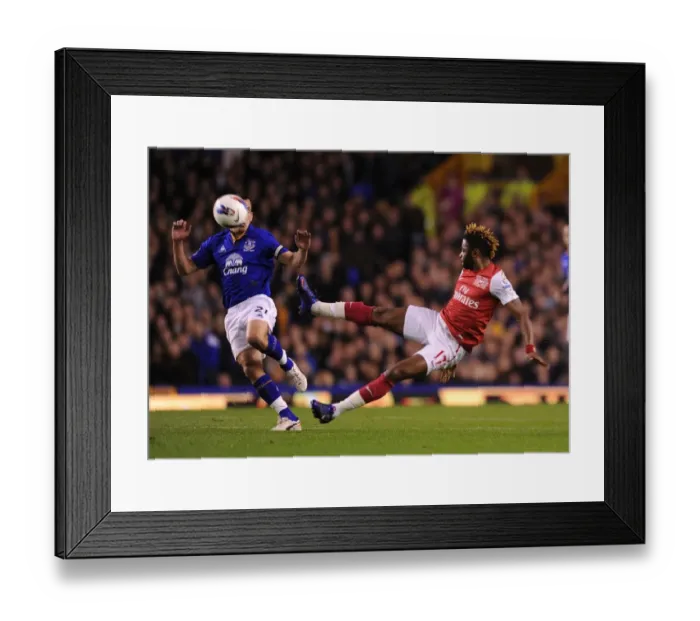 Framed Print : Clash at Goodison Park: Alex Song vs. Leon Osman