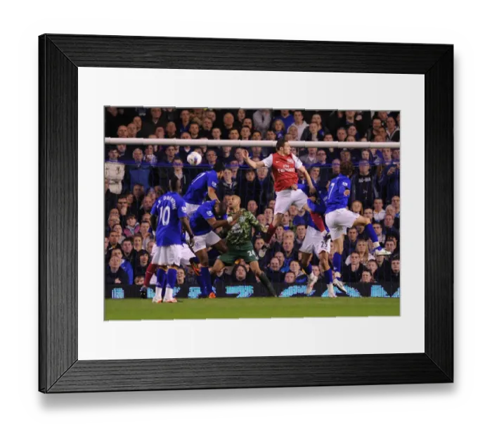 Framed Print : Thomas Vermaelen's Soaring Header: A Crucial Goal for Arsenal Against Everton (2011-12) Framed Print : Thomas Vermaelen's Soaring Header: A Crucial Goal for Arsenal Against Everton (2011-12)
