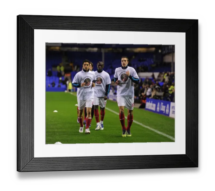 Framed Print : Arsenal Players Honor Fabrice Muamba with Tribute T-Shirts before Everton Match (2012) Framed Print : Arsenal Players Honor Fabrice Muamba with Tribute T-Shirts before Everton Match (2012)