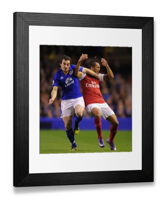 Framed Print : Intense Rivalry: Theo Walcott vs Leighton Baines - Everton vs Arsenal, Premier League 2011-12