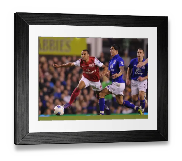 Framed Print : Theo Walcott vs. Tim Cahill: Battle at Goodison Park - Everton vs. Arsenal, Premier League 2011-12