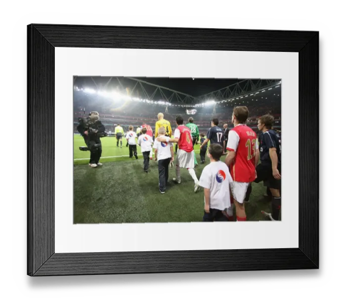 Framed Print : Cesc Fabregas and Alex Hleb (Arsenal) walk out before the match