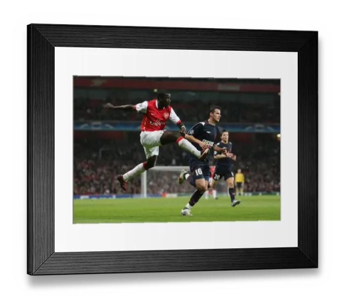 Framed Print : Emmanuel Eboue (Arsenal) Daniel Pudil (Slavia) Framed Print : Emmanuel Eboue (Arsenal) Daniel Pudil (Slavia)