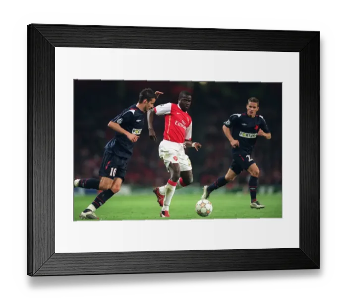 Framed Print : Arsenal's Dominant 7-0 Win over Slavia Prague: Eboue's Double Strike Framed Print : Arsenal's Dominant 7-0 Win over Slavia Prague: Eboue's Double Strike