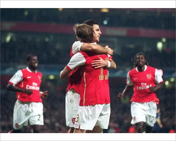 Cesc Fabregas celebrates scoring Arsenals 1st goal with Alex Hleb