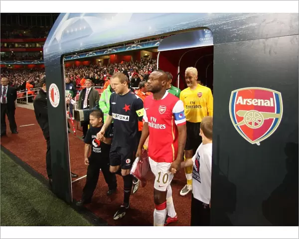 William Gallas (Arsenal) Stanislav Vlcek (Slavia) walk out before the match
