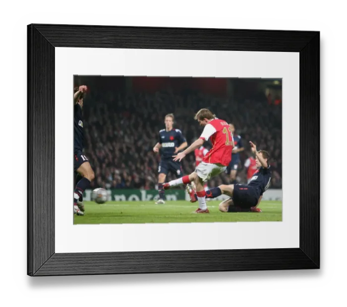 Framed Print : Alex Hleb scores Arsenals 4th goal under pressure from Zdenek Senkerik (Slavia) Framed Print : Alex Hleb scores Arsenals 4th goal under pressure from Zdenek Senkerik (Slavia)