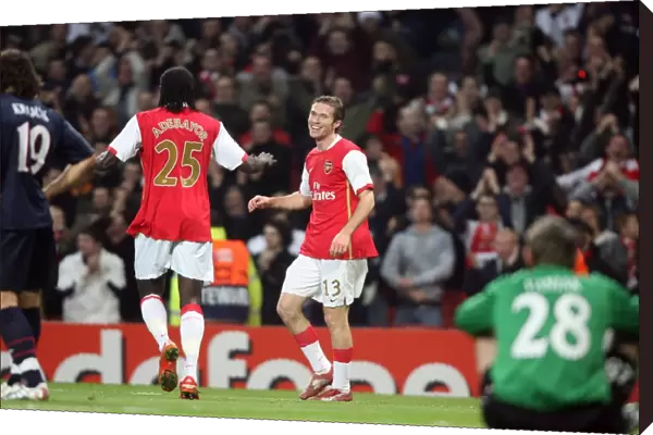 Alex Hleb celebrates Arsenals 2nd goal with Emmanuel Adebayor