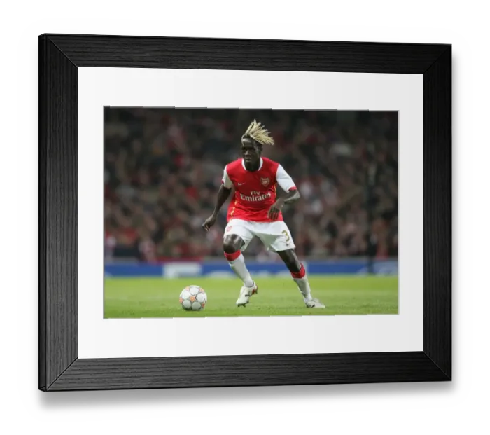 Framed Print : Arsenal's Sagna Shines: 7-0 Crush of Slavia Prague in Champions League Group H