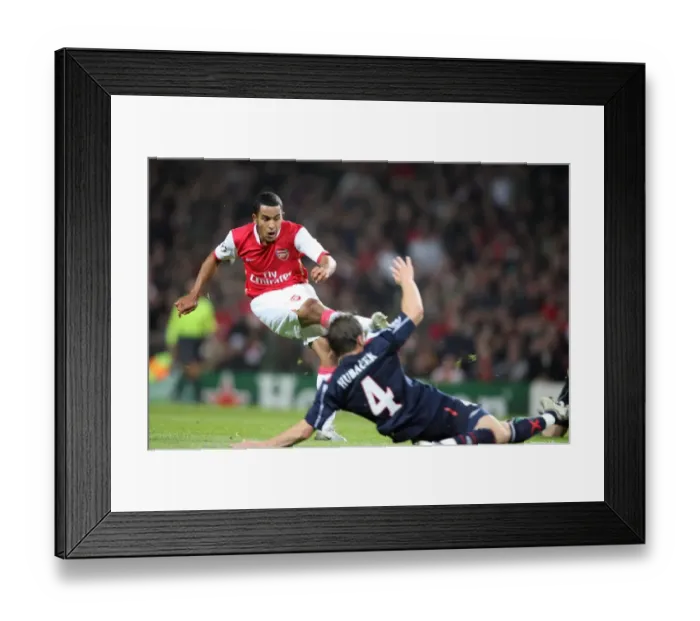 Framed Print : Theo Walcott scores Arsenals 3rd goal, his 1st past David Hubacek (Slavia) Framed Print : Theo Walcott scores Arsenals 3rd goal, his 1st past David Hubacek (Slavia)