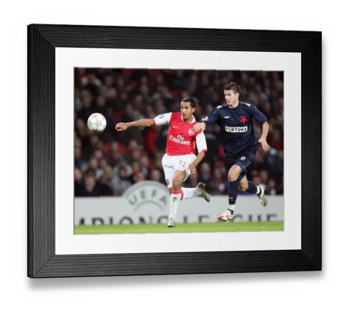 Framed Print : Theo Walcott's Hat-Trick: Arsenal Crushes Slavia Prague 7-0 in Champions League Group H