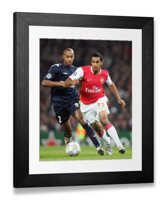 Framed Print : Theo Walcott's Hat-Trick: Arsenal's Dominant 7-0 Victory Over Slavia Prague in Champions League Group H