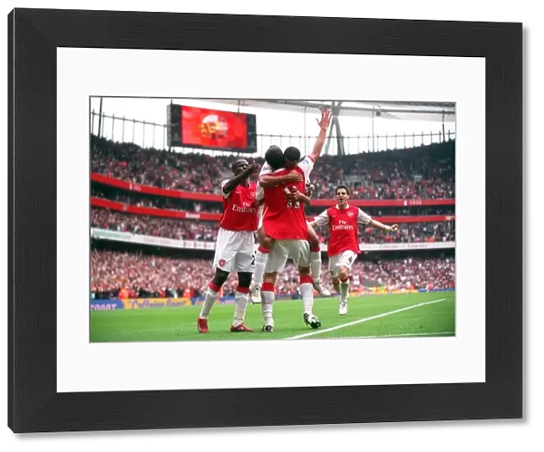 Robin van Persie celebrates scoring Arsenals 3rd goal his 2nd with Theo Walcott